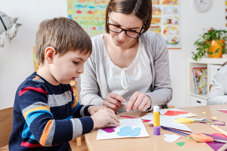 Mother with creative kid having fun time together
